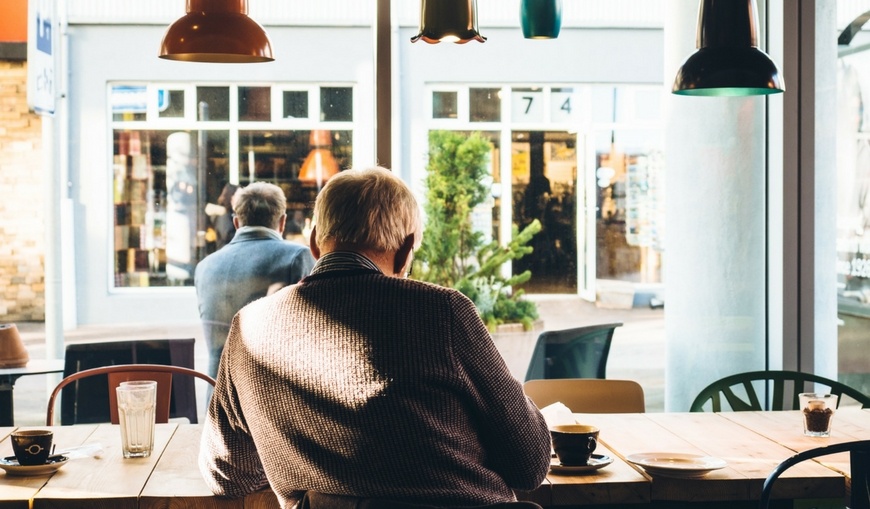 guy-writing-in-coffeeshop.jpg