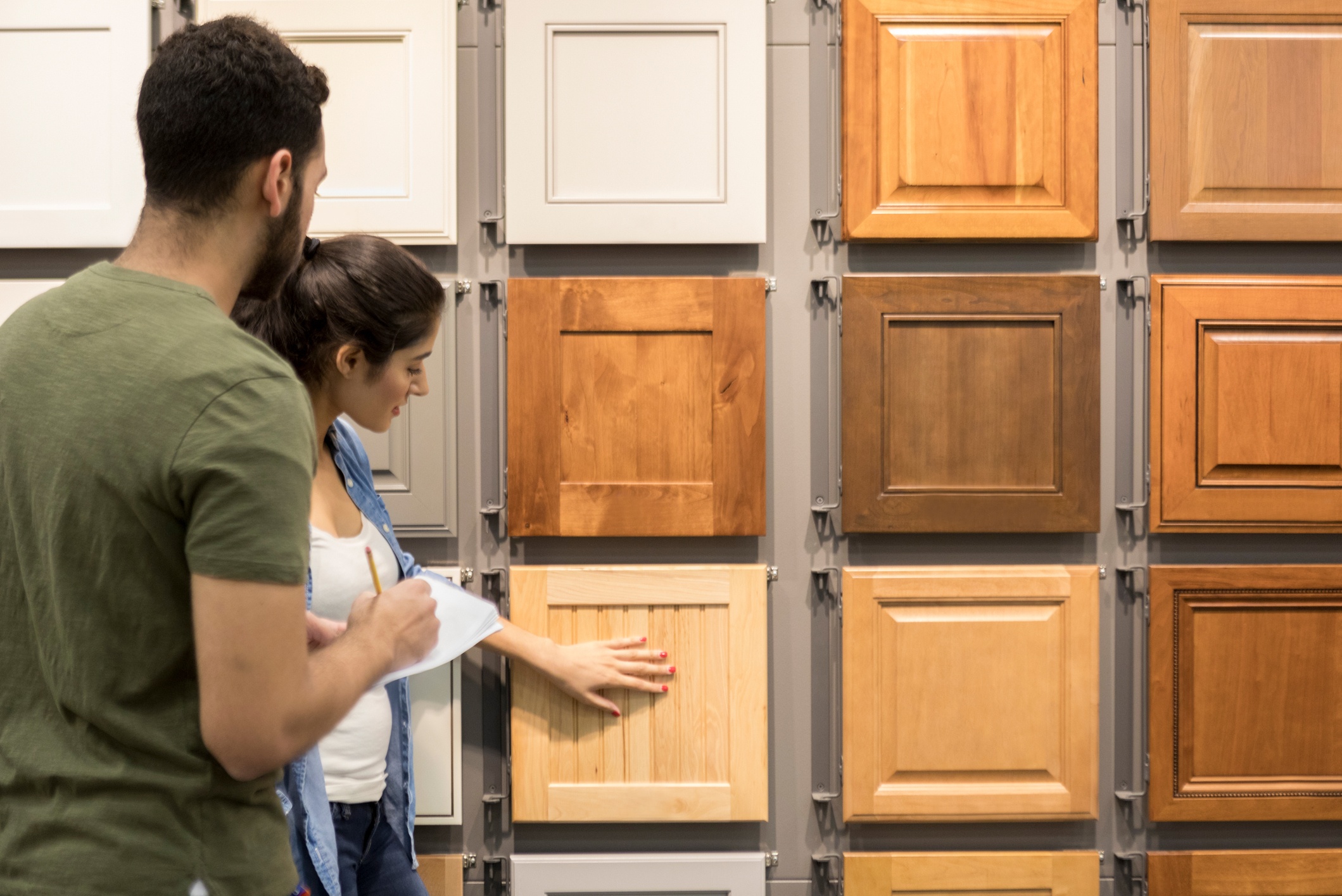 couple shopping for cabinets