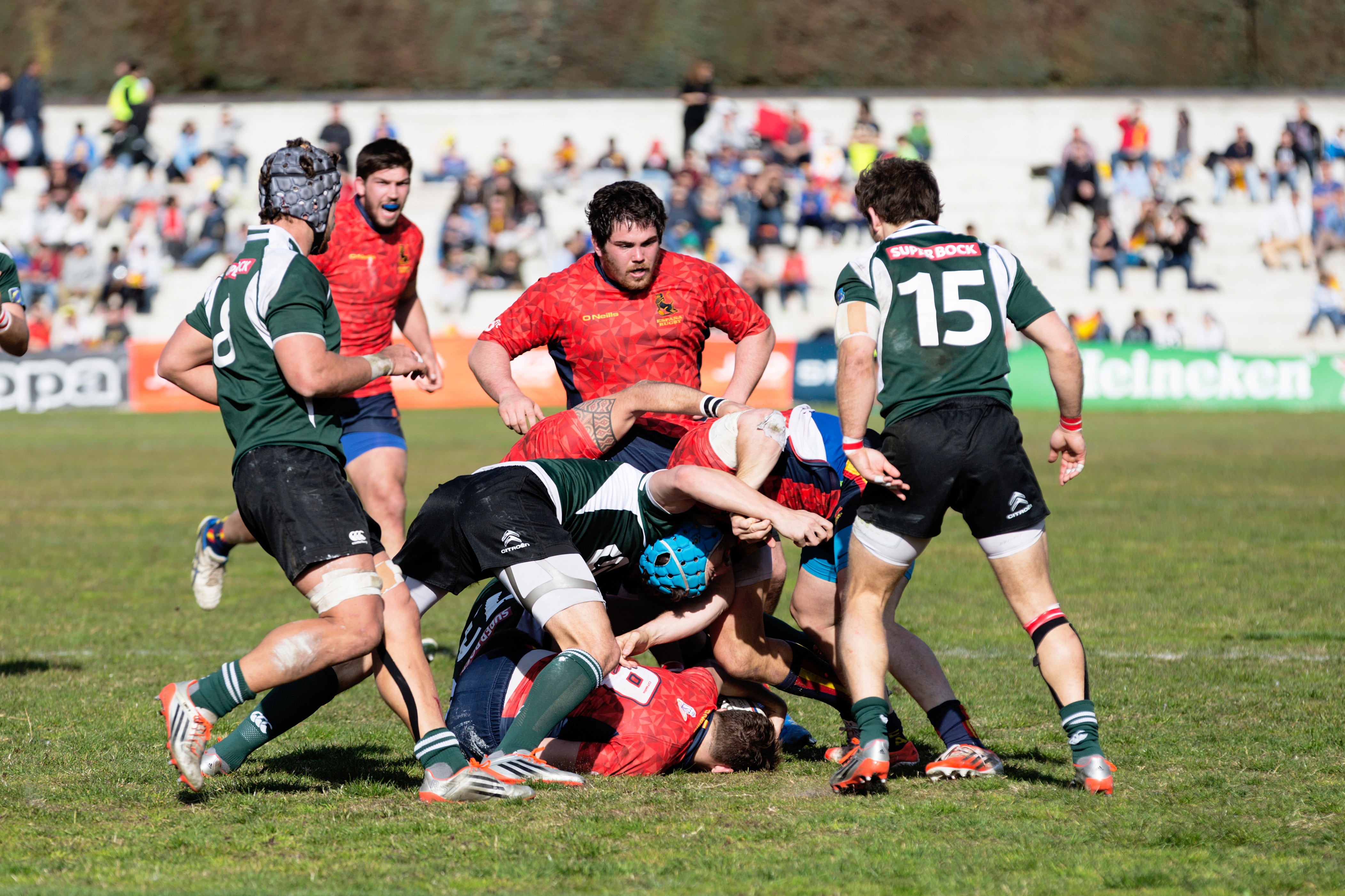 men-playing-footy-rugby