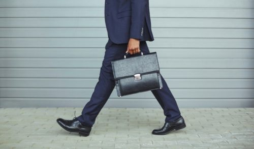 business-man-walking-with-briefcase